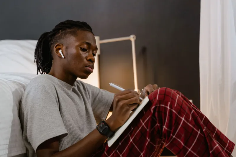 What's Playing While You Write: How Your Journaling Soundtrack Shapes the Words You Find